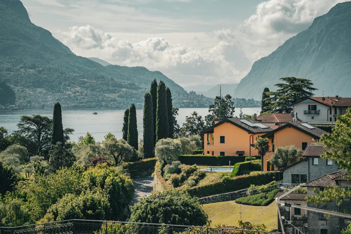 The waterfront promenade and mountains of Menaggio on Lake Como